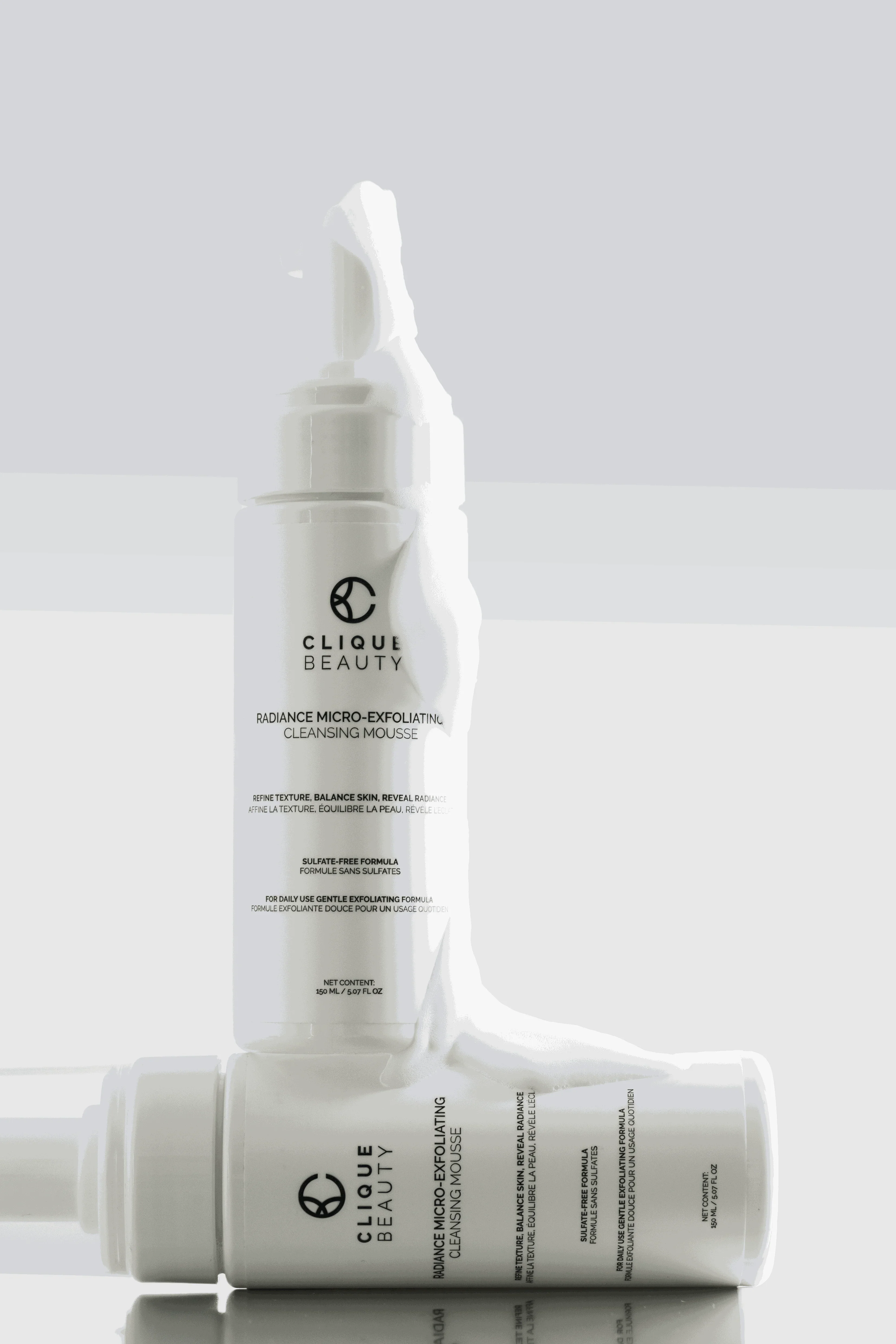 Radiance Micro-Exfoliating Cleansing Mousse pump bottle on a light background