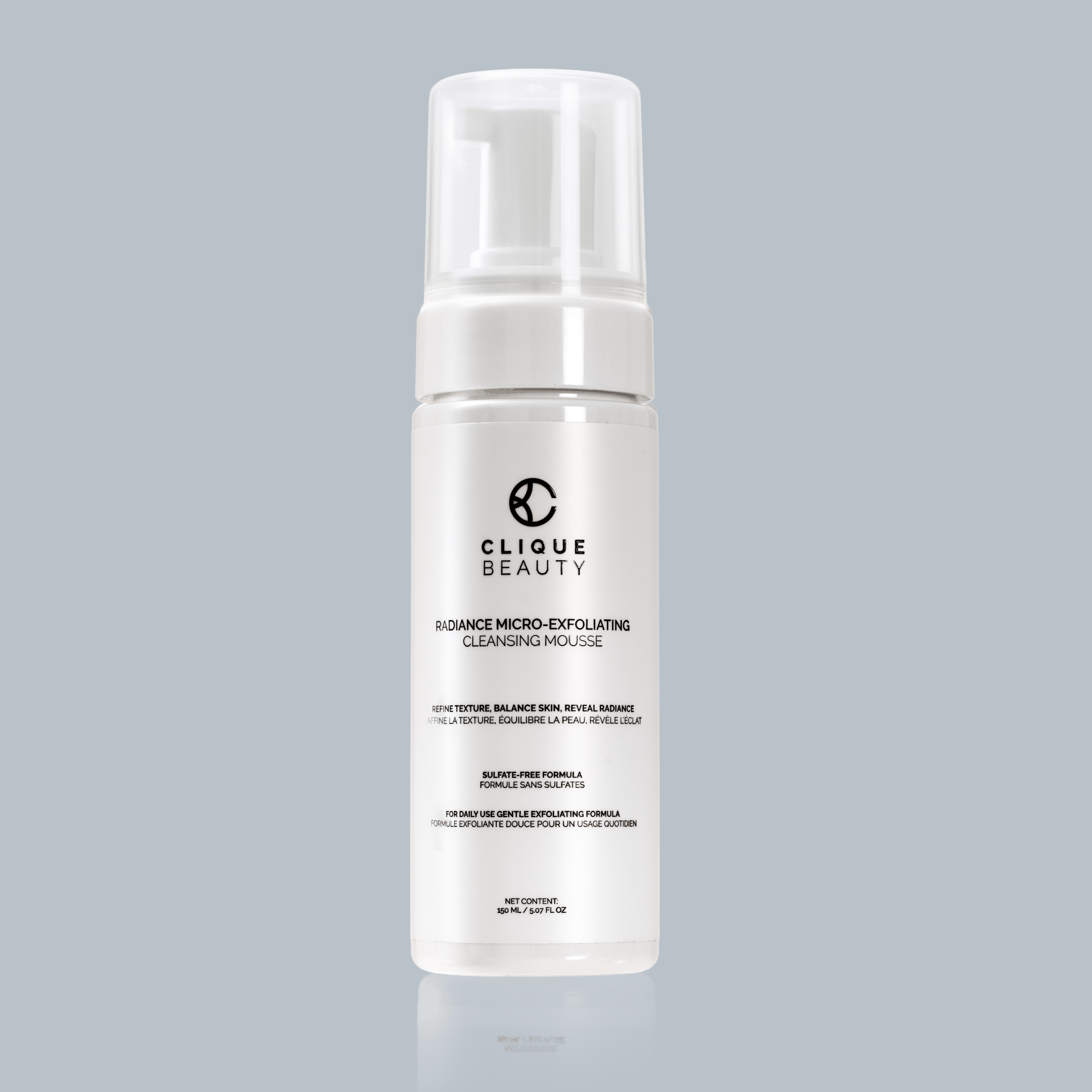 Clique Beauty cleansing mousse bottle on a gray background
